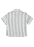 The Blake Top by Beckett and Bear is a 100% cotton short-sleeve button-up with vertical light blue and white stripes, a collar, loose fit, and shown from the back.