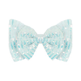The Mabel and Honey Under the Sea Sequin Hair Accessory is a light blue girl's hair bow with a rounded shape, decorated with neat rows of shiny, iridescent sequins for sparkling style.