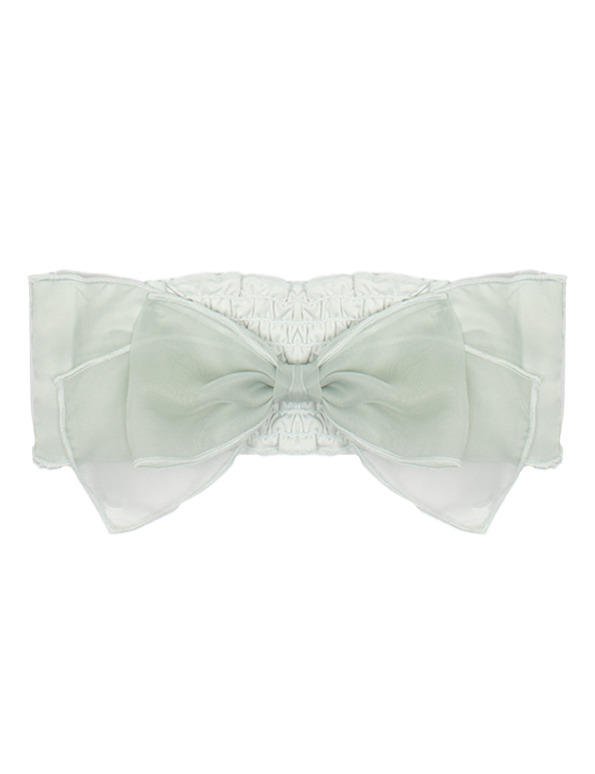 The Isobella and Chloe Jade Hair Accessory features a large pale green organza bow with layered sheer loops on a stretchy white band, creating an elegant and delicate look for girls.