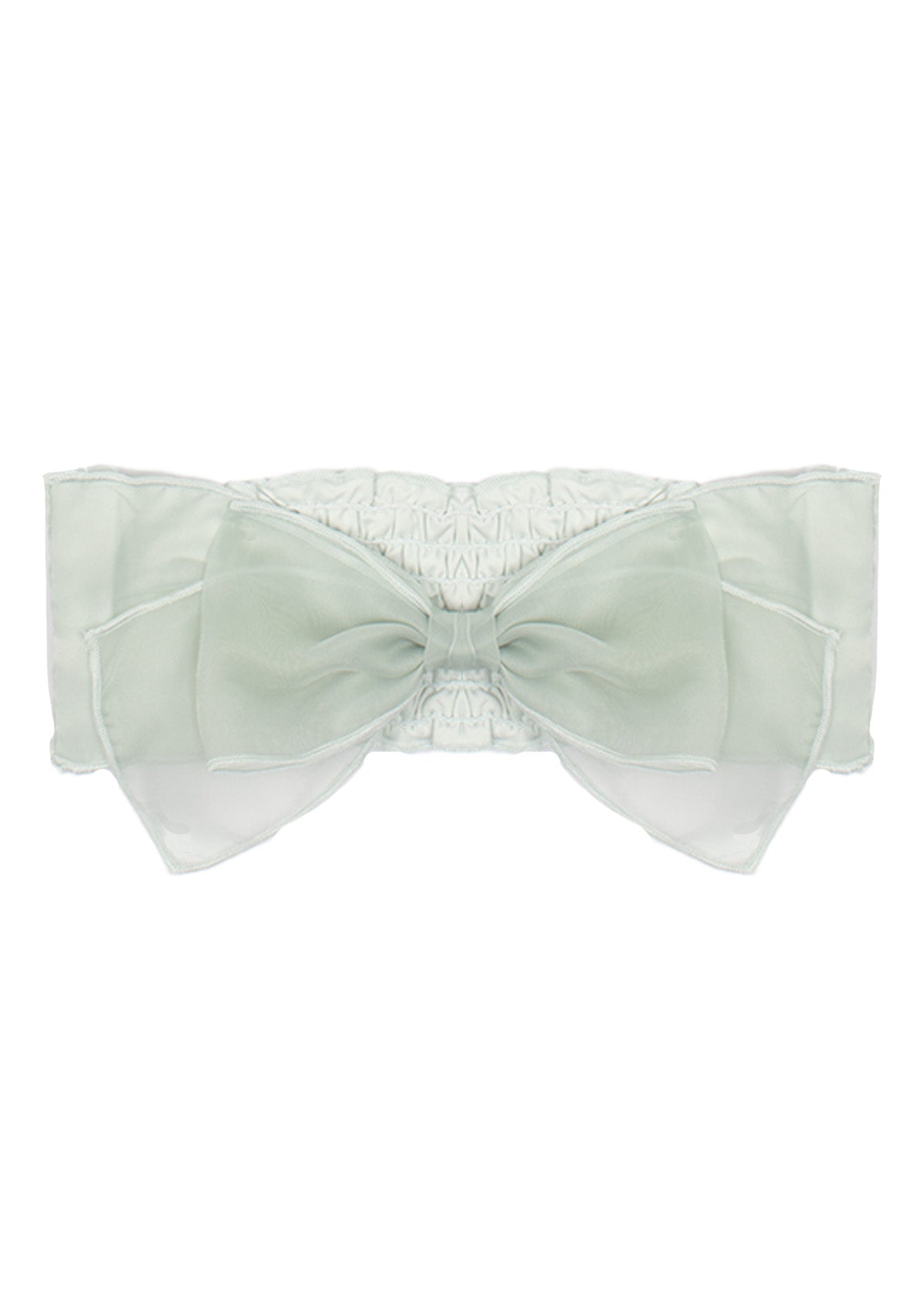 The Isobella and Chloe Jade Hair Accessory features a large pale green organza bow with layered sheer loops on a stretchy white band, creating an elegant and delicate look for girls.