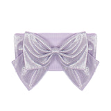 The Sabrina Hair Accessory by Isobella and Chloe features a shiny lavender metallic large bow with textured, reflective fabric on a matching ribbon band—an ideal girl's hair accessory.