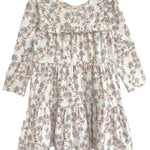 The Sadie Dress by Mabel and Honey is a charming long-sleeve baby girl dress with a white background, blue, pink, and green floral print, ruffled layers, and a round neckline—ideal for any special occasion.