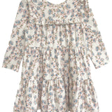 The Sadie Dress by Mabel and Honey is a charming long-sleeve baby girl dress with a white background, blue, pink, and green floral print, ruffled layers, and a round neckline—ideal for any special occasion.