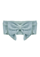 The Blair Hair Accessory by Mabel and Honey is a light blue corduroy ribbed headband with a large front bow—a stylish addition to any look.