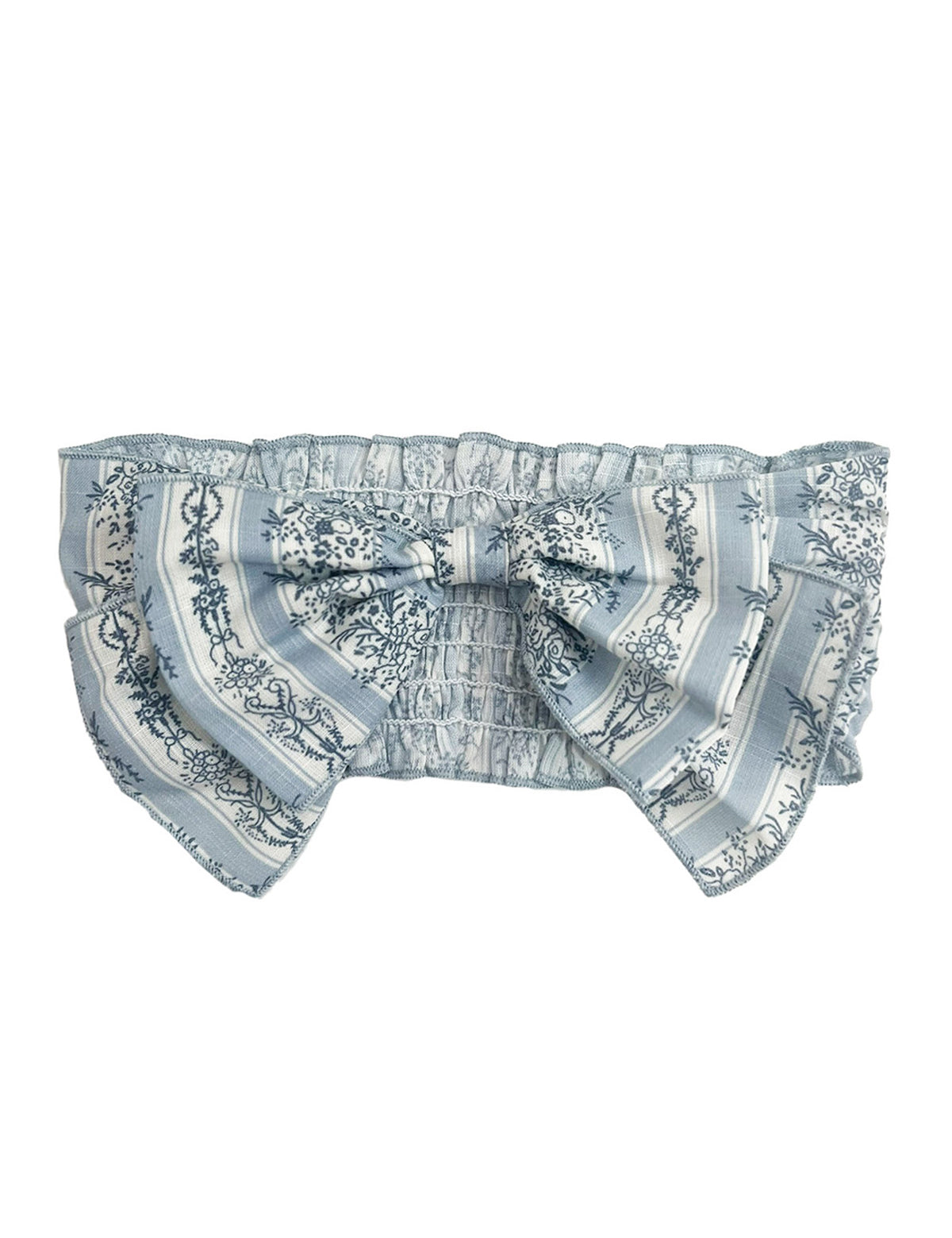 The Georgina Hair Accessory by Mabel and Honey is a light blue and white ruffled headband with a large decorative bow, featuring floral and striped patterns—an adorable choice for baby girls.