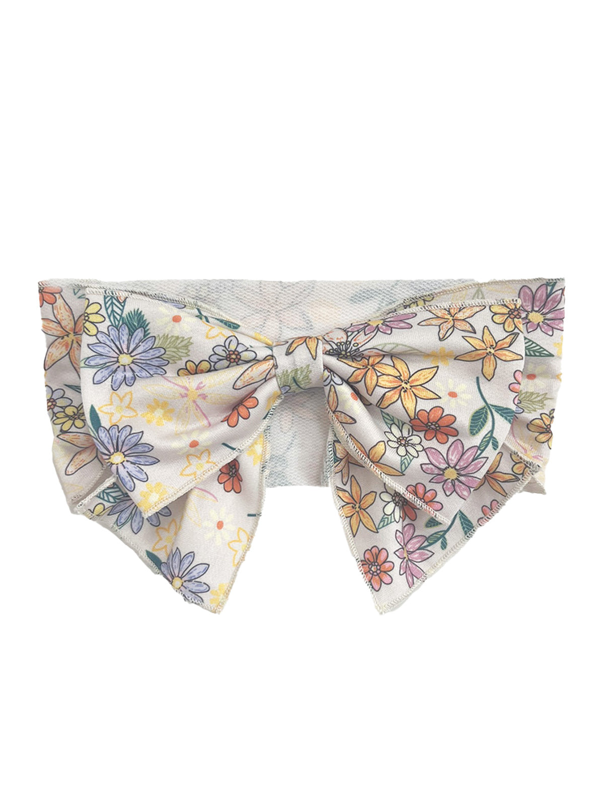 The Flower Field Hair Accessory by Mabel and Honey features a colorful floral print on white, with yellow, orange, purple, and pink flowers plus green leaves—perfect as an elegant statement hair bow.