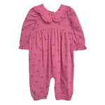 The Perfect in Pink Romper by Mabel and Honey is a baby girl romper featuring long sleeves, a ruffled collar, elasticized cuffs and ankles, and a cute dark pink heart pattern for a sweet, playful look.