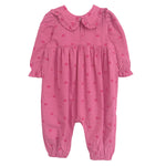 The Perfect in Pink Romper by Mabel and Honey is an adorable pink baby girl outfit featuring long sleeves, a ruffled collar, heart pattern, and gathered details at the waist, wrists, and ankles for a sweet, comfy fit.
