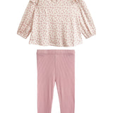 The Mabel and Honey Primrose Two Piece Set features a long-sleeve, pale pink floral top with a ruffled collar and matching leggings, displayed on a white background—an adorable outfit for baby girls.