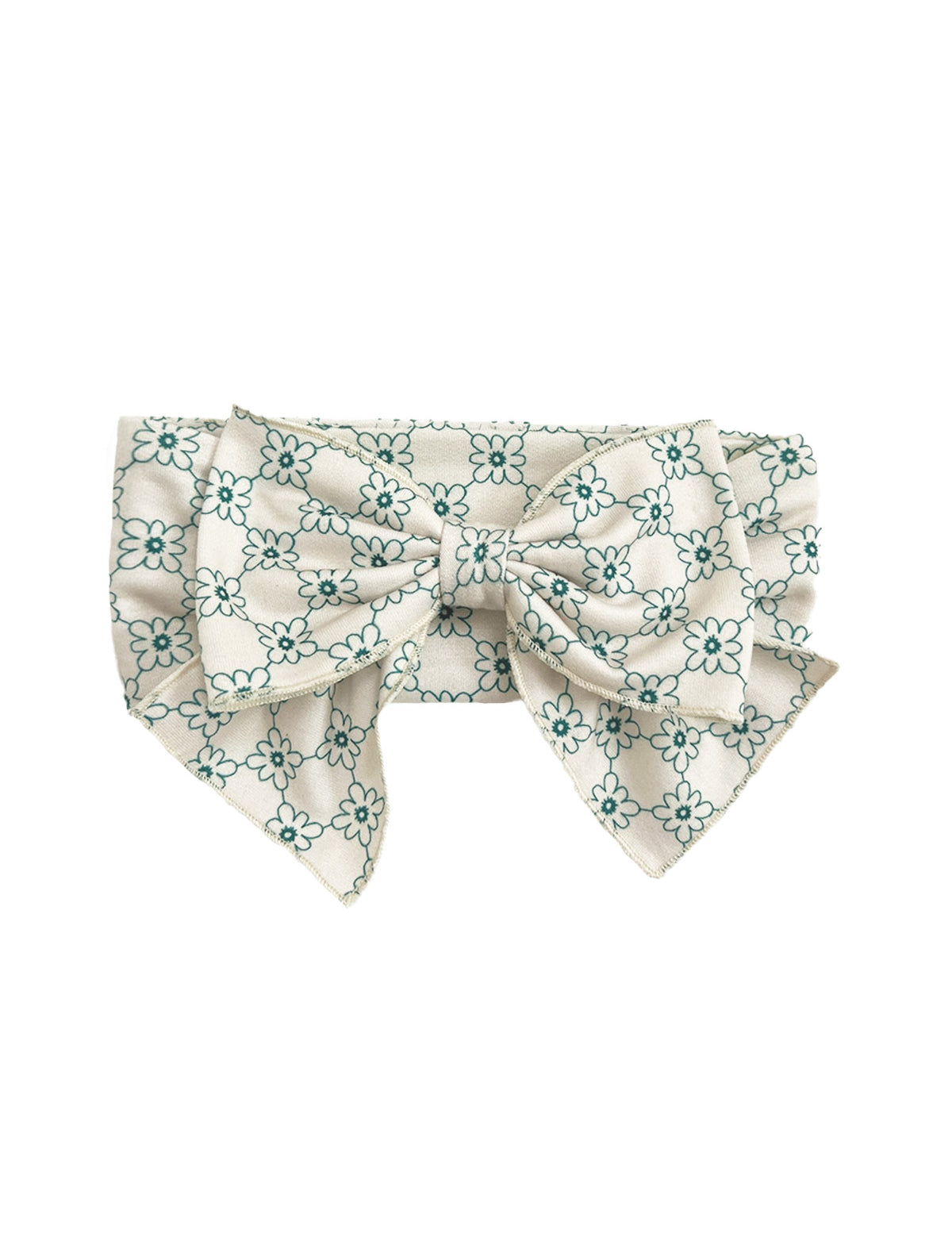 The Lillian Hair Accessory by Mabel and Honey is a vintage-inspired white fabric floral bow with teal patterns, two wide tails, a large central knot, and a textured look for added charm.