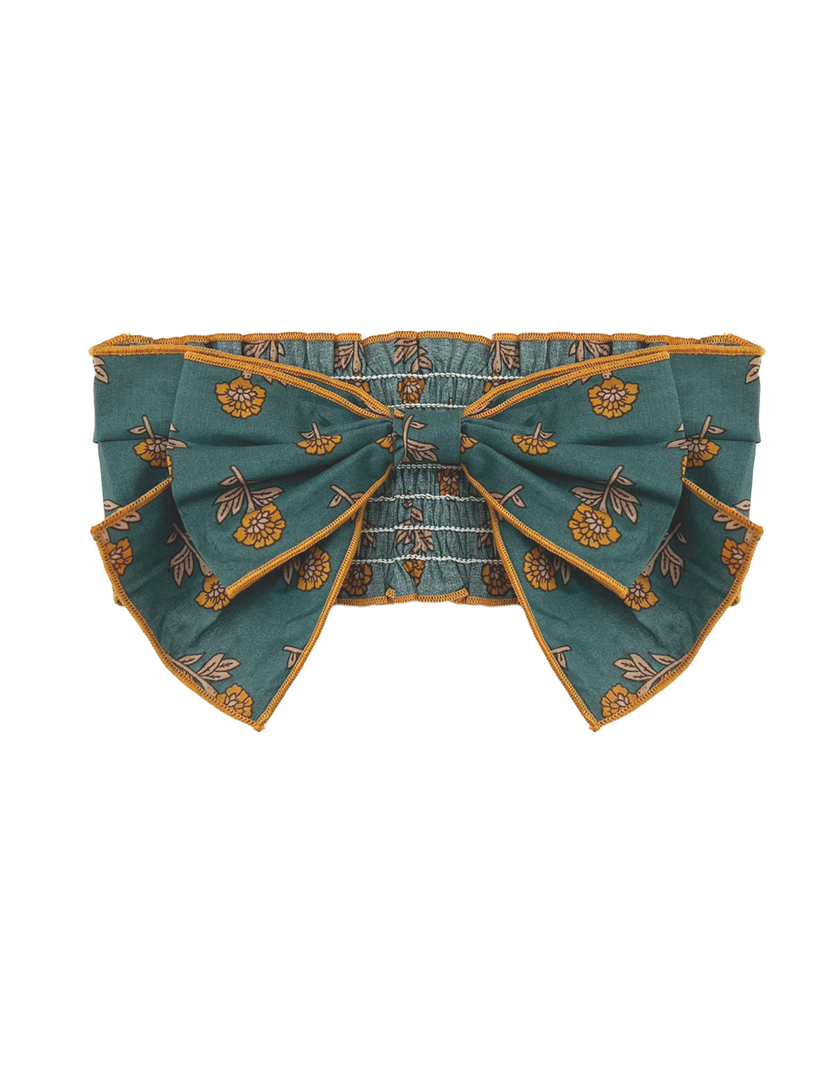 A teal belt with yellow floral patterns, an oversized center bow, and gold-trimmed edges pairs perfectly with the Mabel and Honey Autumn Ivy Hair Accessory.