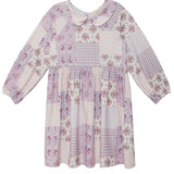 The Liliana Floral Dress by Mabel and Honey features a Peter Pan collar, long sleeves, and soft pink, lavender, and white floral gingham patterns. Gathered fabric at the waist and cuffs adds a touch of classic charm.