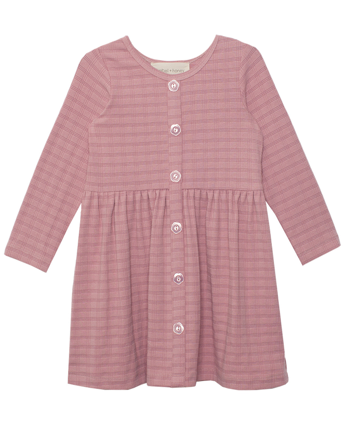 The Liliana Plaid Dress by Mabel and Honey is a childrens long-sleeve, dusty pink plaid dress with a round neckline, front button closure, gathered waist, and an A-line skirt.
