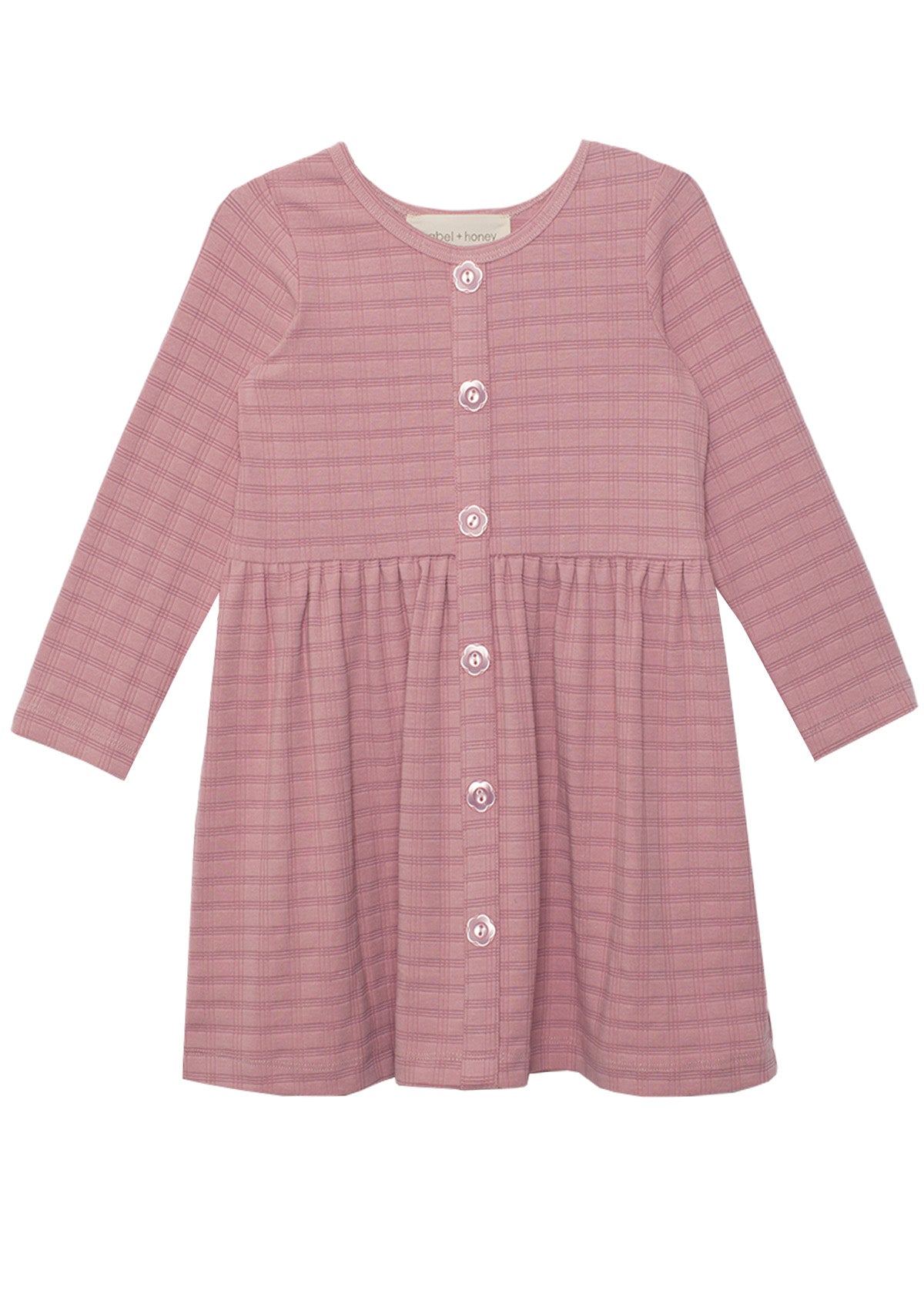 The Liliana Plaid Dress by Mabel and Honey is a childrens long-sleeve, dusty pink plaid dress with a round neckline, front button closure, gathered waist, and an A-line skirt.