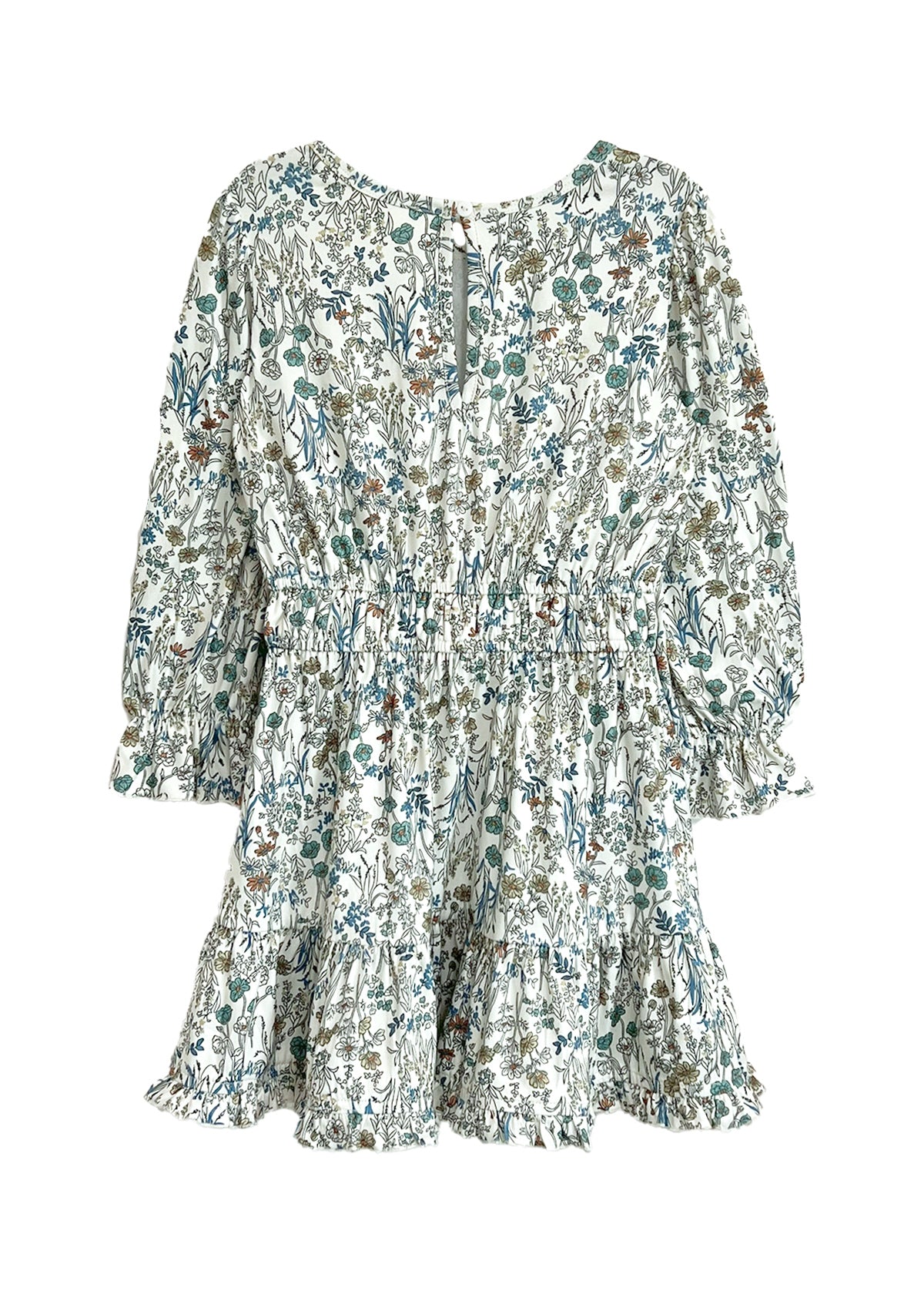 The Brooklyn Floral Dress by Mabel and Honey is a girls' knee-length dress in green, blue, and brown floral on white with long sleeves, a gathered waist, ruffled hem, and button-back closure.