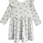 The Mabel and Honey Heartfelt Dress is a light gray, long-sleeved dress with small black hearts, ruffled shoulders, a gathered waist, and a casual design—perfect for everyday wear.