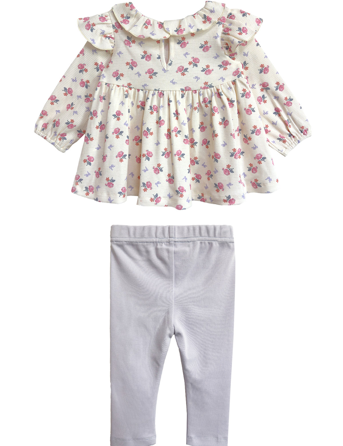 The Mia Two Piece Set by Mabel and Honey includes a cream floral ruffle blouse with a keyhole neck and light gray leggings—an adorable girls' outfit perfect for any occasion.