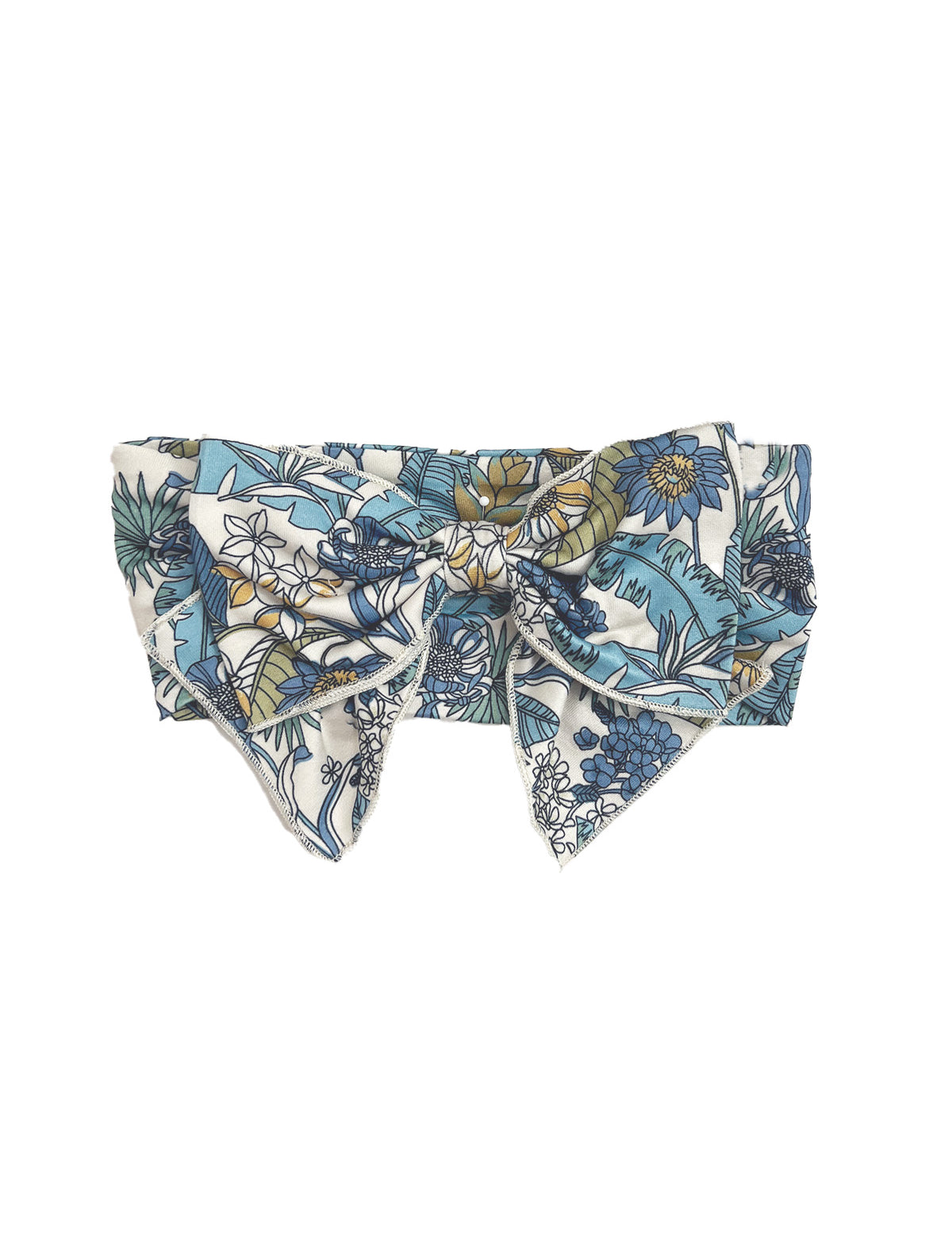 The Leah Hair Accessory by Mabel and Honey is a floral headband with a large bow, featuring a charming blue, green, and white print.
