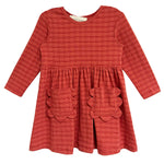 The Mabel and Honey Tea Party Red Gingham Dress features long sleeves, a round neck, gathered waist, and two scalloped skirt pockets—combining comfort and classic style for any occasion.