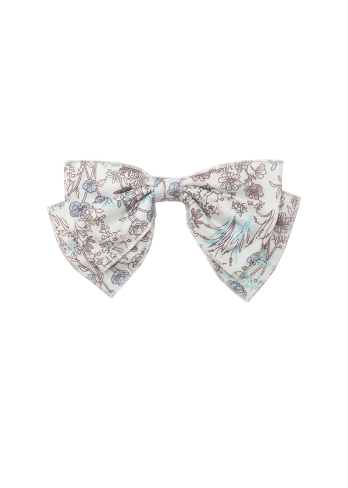The Mabel and Honey Meadow Hair Accessory is a lightweight fabric bow for baby girls, featuring brown and light blue floral patterns on white. Shown against a plain white backdrop.