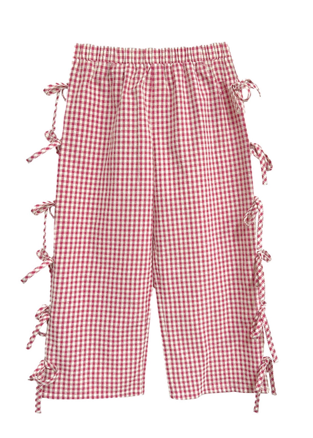 The Bow-tastic Pant by Mabel and Honey features red and white gingham, an elastic waistband, side slits with bow accents, and a wide-leg cropped fit—adding playful charm to any outfit.
