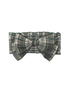 The Plaid & Pine Hair Accessory by Mabel and Honey is a green and white plaid headband with a large center bow and stitched edge detail—an adorable, handcrafted baby hair accessory.