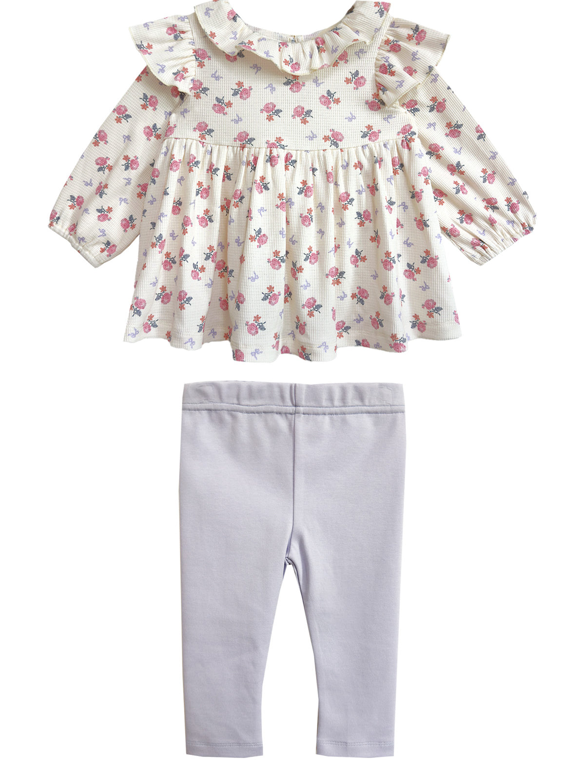 The Mia Two Piece Set by Mabel and Honey includes a floral blouse with a ruffled collar and long sleeves, paired with light purple leggings—an adorable outfit for girls.