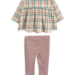 The Phoebe Two Piece Set by Mabel and Honey includes a pastel plaid top with gathered waist and long sleeves, paired with solid pink leggings—cute and comfy for toddlers.