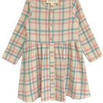 The Phoebe Dress by Mabel and Honey is a long-sleeve cotton girls’ dress with pink, blue, and beige plaid, wooden front buttons, and a gathered waist—perfect for any occasion.
