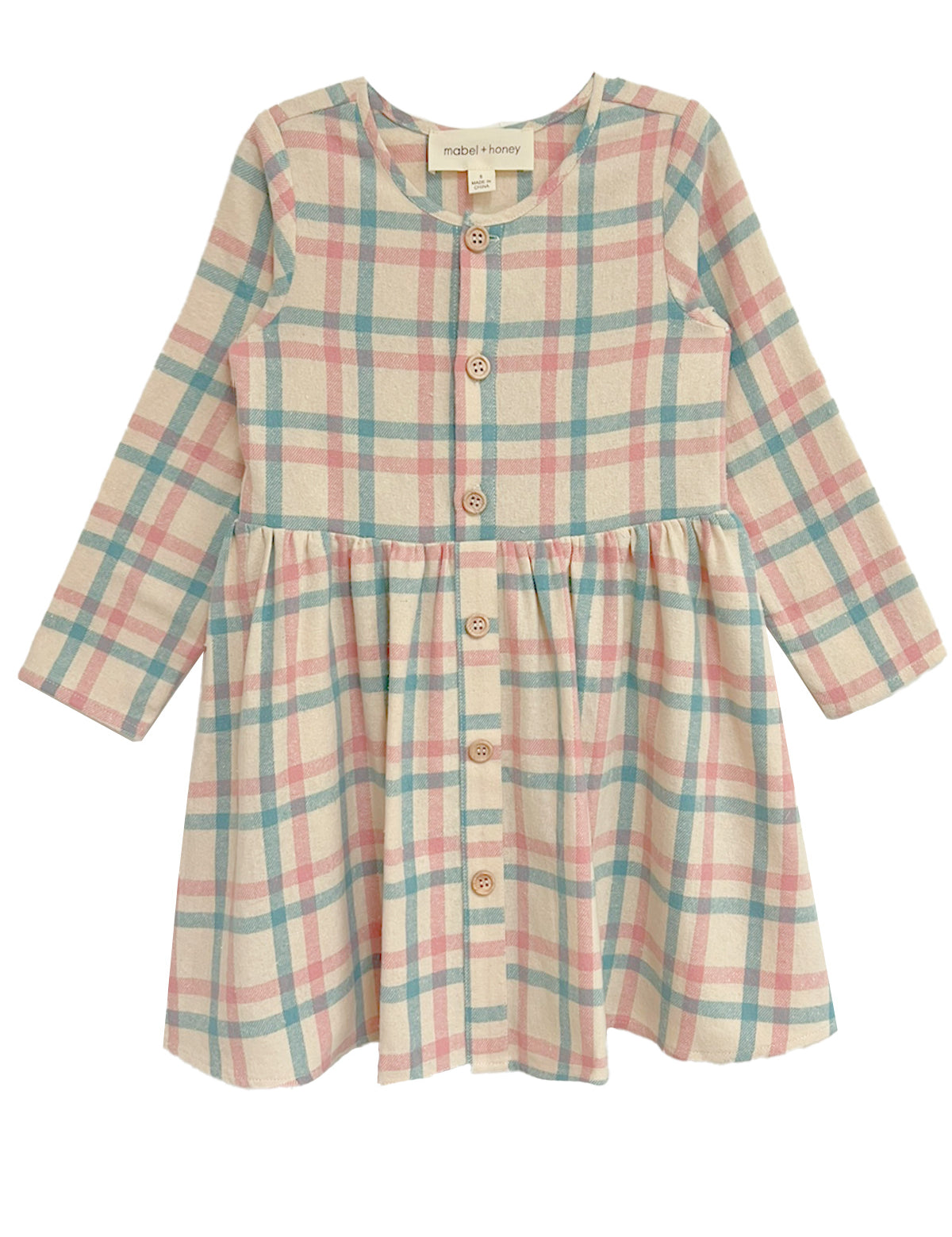 The Phoebe Dress by Mabel and Honey is a long-sleeve cotton girls’ dress with pink, blue, and beige plaid, wooden front buttons, and a gathered waist—perfect for any occasion.