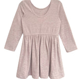 The Heather Dress by Mabel and Honey is a ribbed pink long sleeve dress for children, featuring a round neckline, gathered skirt, and soft textured fabric for comfort.
