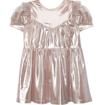 The Isobella and Chloe Golden Glow Pink Dress is a metallic pink children’s dress with puffed short sleeves, ruffled shoulder details, and an A-line silhouette.