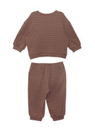 The Beckett and Bear Theo Two Piece Set for kids features a brown checkered plaid design with a long-sleeve top and matching elastic-cuff pants, both shown flat on a white background.