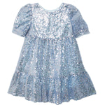The Isobella and Chloe Starry Blue Glitter Dress is a light blue girls' party dress with shimmering sequins, puffy sleeves, a round neckline, flared gathered skirt, and a playful keyhole back opening.
