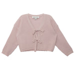The Isobella and Chloe Ballerina Sweater features a light pink, long-sleeve, cropped waffle-knit design with a V-neckline and two front tie closures. The label is visible inside the neckline.