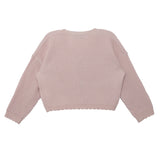 The Isobella and Chloe Ballerina Sweater in light pink features long sleeves, a waffle-knit texture, and delicate scalloped hem and cuffs, shown laid flat with the back side up.