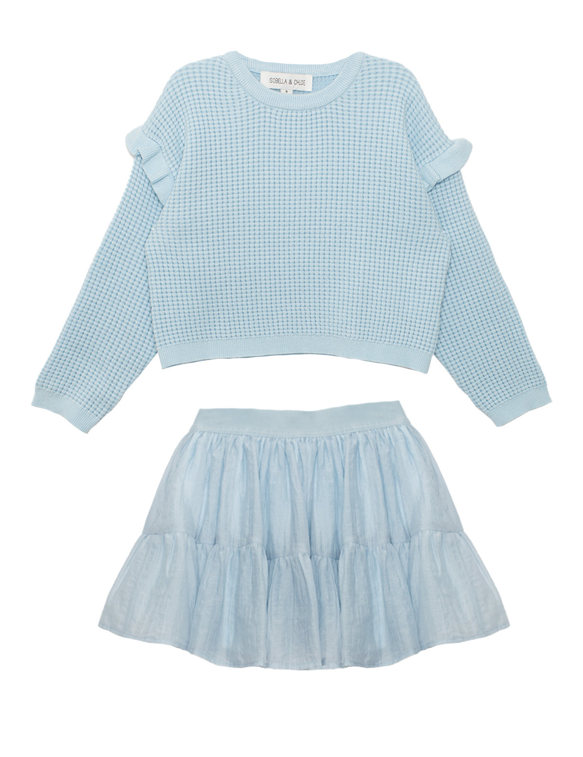 The Tutu in the Clouds Two Piece Set by Isobella and Chloe features a light blue waffle-knit top with ruffle sleeves and a tiered flared skirt, displayed flat on a white background.