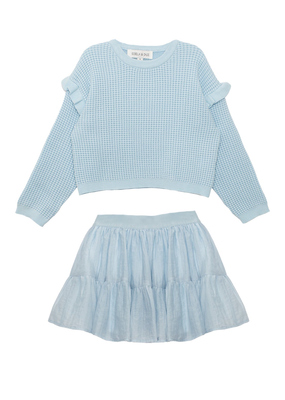 The Tutu in the Clouds Two Piece Set by Isobella and Chloe features a light blue waffle-knit top with ruffle sleeves and a tiered flared skirt, displayed flat on a white background.