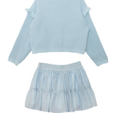 The Isobella and Chloe "Tutu in the Clouds Two Piece Set" features a light blue waffle-knit long sleeve top with ruffled shoulders and a tiered flowy skirt, both laid flat on a white background.