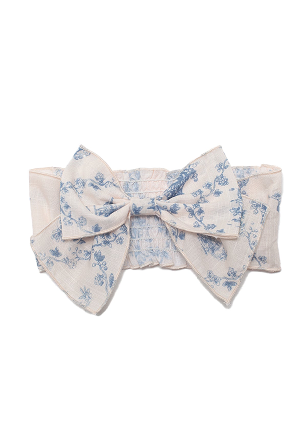 The Isobella and Chloe Princess Hair Accessory is a wide cream headband with a textured, gathered design and a large blue floral bow, adding elegant charm to any girls outfit.
