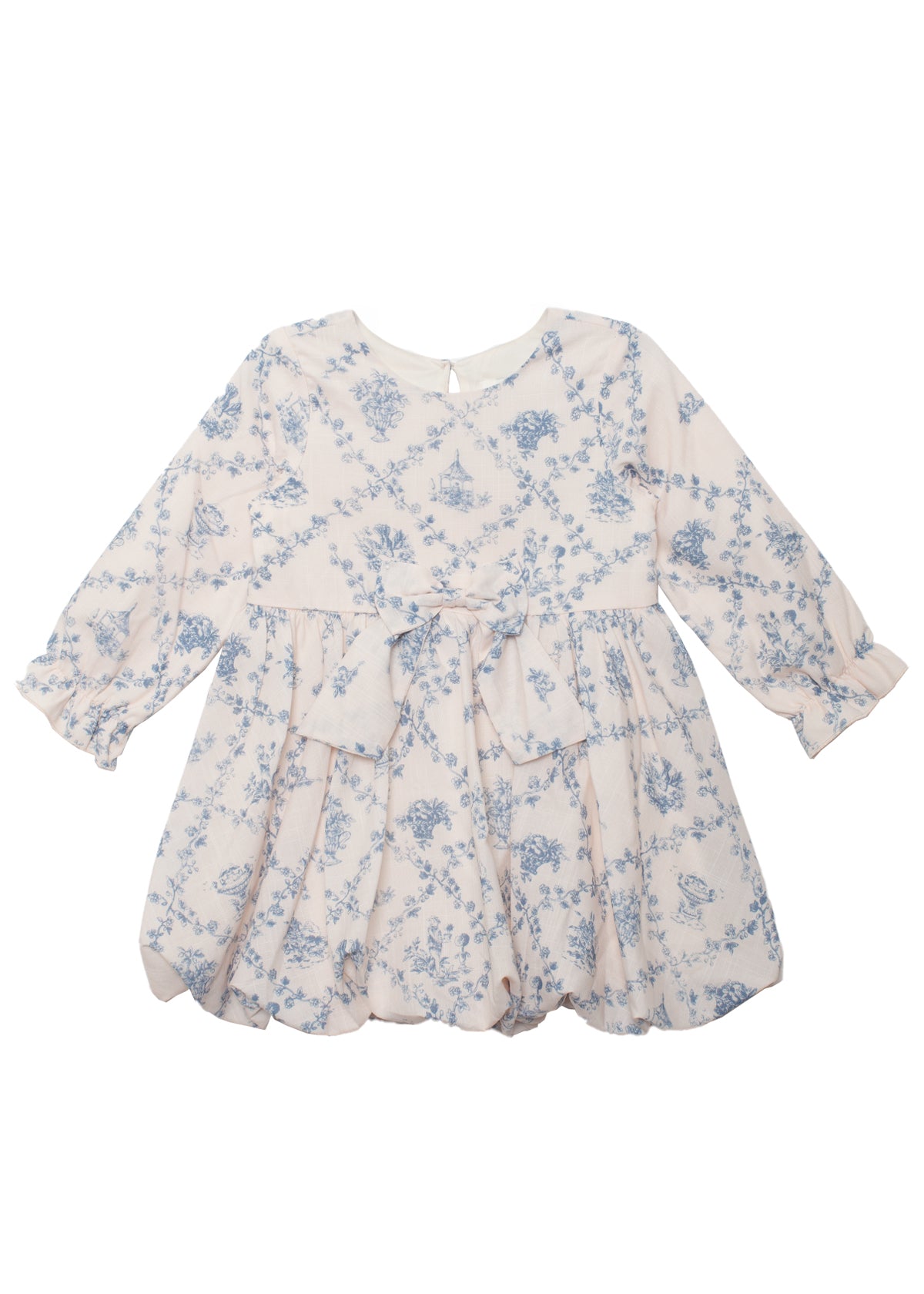 The Mabel and Honey Princess Dress is a charming long-sleeved child's dress with a blue toile floral pattern, ruffled skirt, scalloped hem, and matching waist bow—perfect for special occasions.