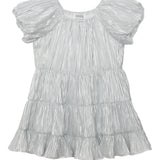 The Sparkle and Spin Silver Dress by Isobella and Chloe features shiny silver fabric, short sleeves, a pleated texture, a ruffled tiered skirt, and a loose, flowy fit—ideal as a party dress that shimmers.