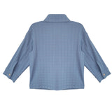 Back view of the Beckett and Bear Lucas Jacket in light blue, featuring long sleeves, a collared design, buttoned cuffs, and a textured grid pattern. The jacket is laid flat on a white background.