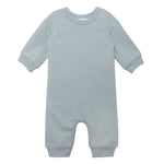 The Beckett and Bear Aiden Romper is a light blue long-sleeve baby romper with ribbed cuffs and inseam snap closures for easy changing.