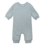The Beckett and Bear Aiden Romper is a light blue long-sleeve baby romper with ribbed cuffs and inseam snap closures for easy changing.