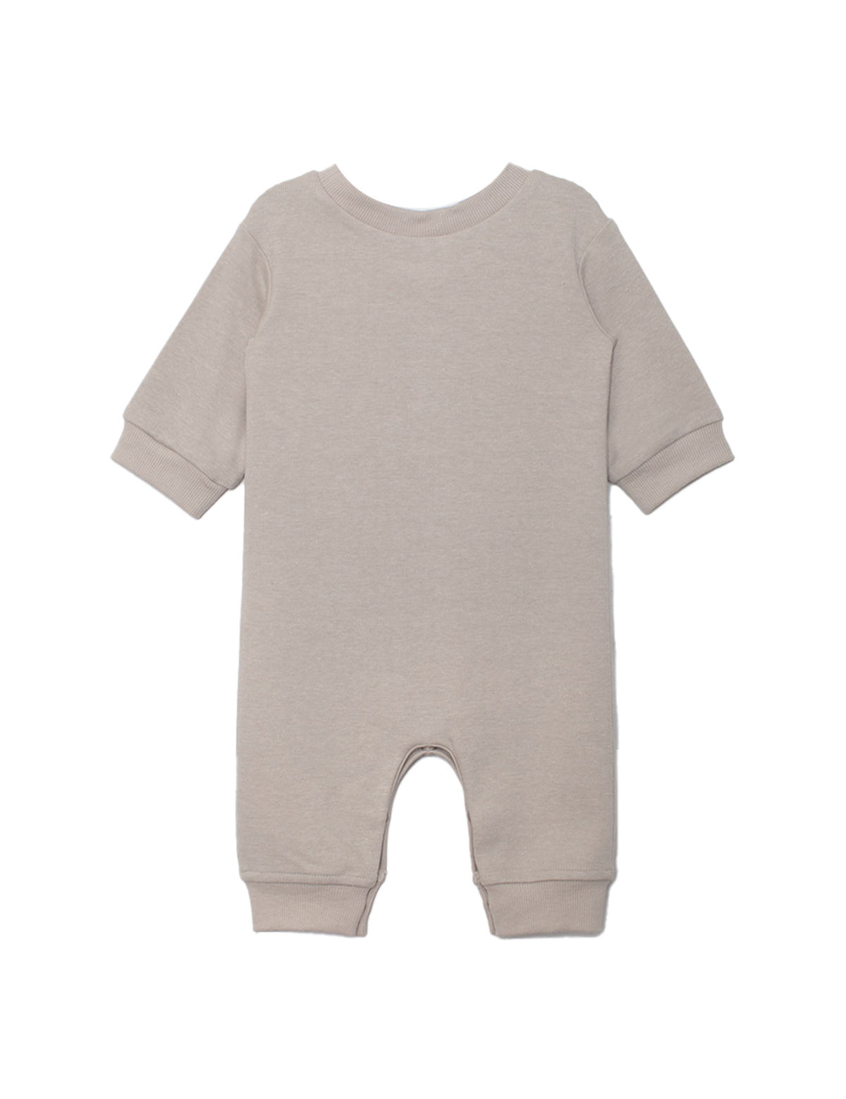 The Beckett and Bear Isaac Romper is a light beige, neutral-tone one-piece with cuffed sleeves and legs. Shown flat from the back, its simple solid design has no visible patterns or decorations.