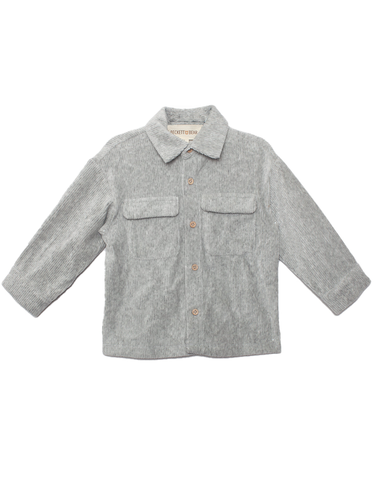 The Beckett and Bear Grayson Jacket is a light gray, long-sleeve corduroy jacket for kids with a collar, two chest pockets, and front button closure—ideal as a layering piece on cool days.