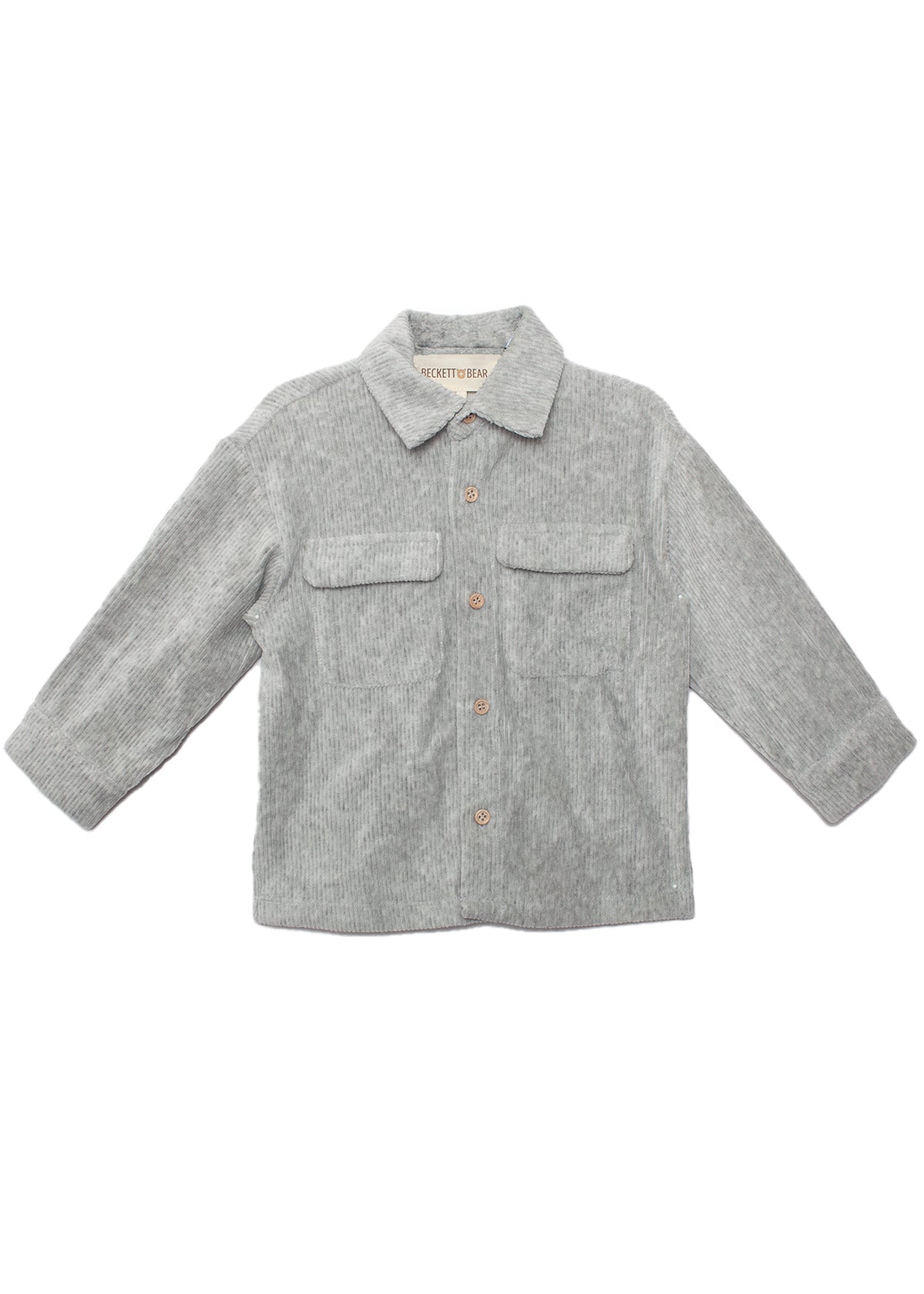 The Beckett and Bear Grayson Jacket is a light gray, long-sleeve corduroy jacket for kids with a collar, two chest pockets, and front button closure—ideal as a layering piece on cool days.