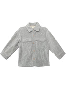 The Beckett and Bear Grayson Jacket is a light gray, long-sleeve corduroy jacket for kids with a collar, two chest pockets, and front button closure—ideal as a layering piece on cool days.