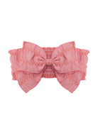 The Mabel and Honey Watermelon Lemonade Hair Accessory features a pink ruffled bow with layered edges and visible stitching, perfect for girls, shown on a plain white background.